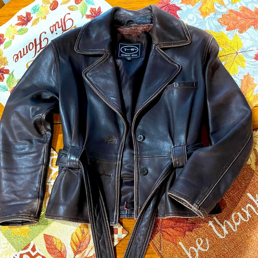 100% Leather Jacket is fully lined and made in Indonesia.